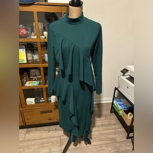HIGH NECK RUFFLE FRONT MIDI DRESS
Perfect for the holidays!!!